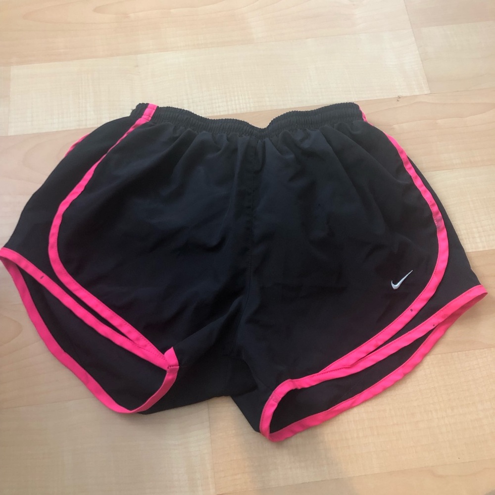 Pink lined Nike track shorts size small